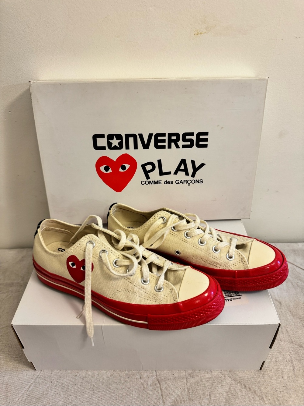 Comme des Garçons PLAY Kids Low Top Sneakers in Cream and Red